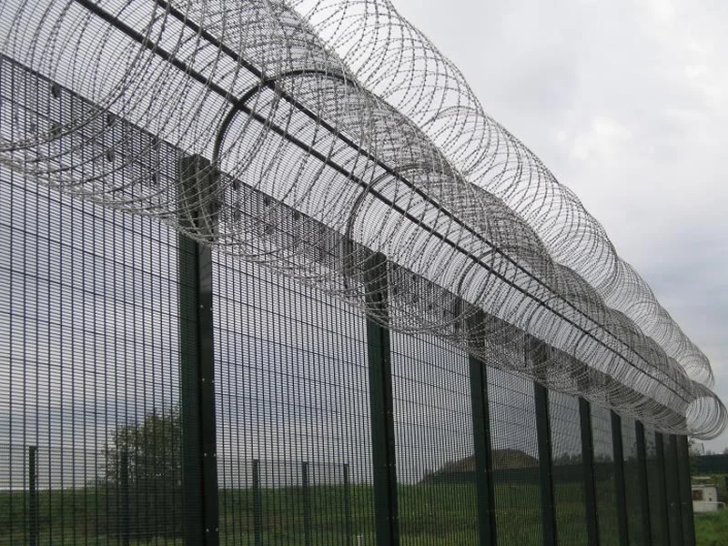 358 high-security mesh fencing with razor wire installation